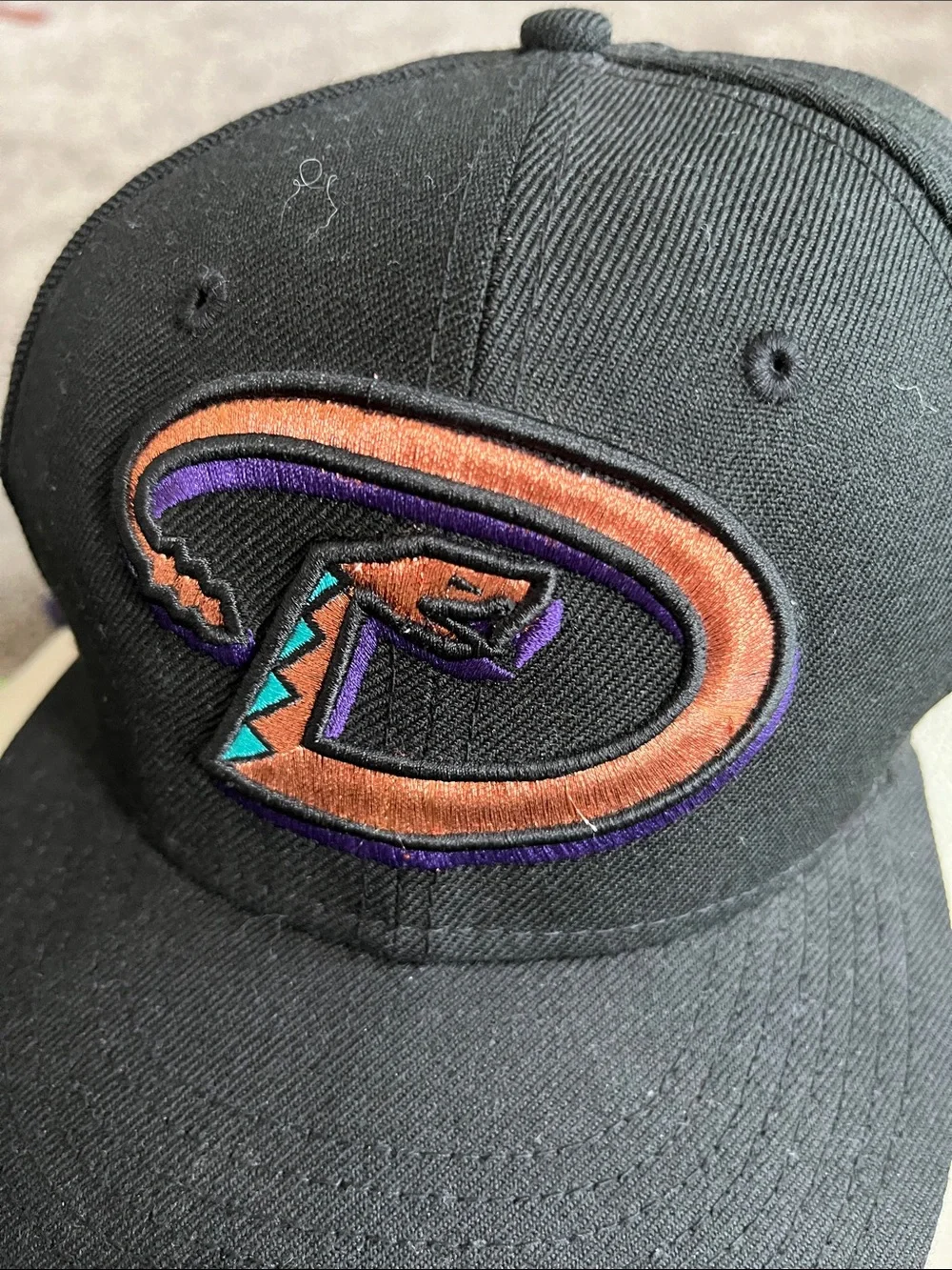 New Era Diamondbacks - Black Hat with Orange, Purple and Teal Snake Logo. 7